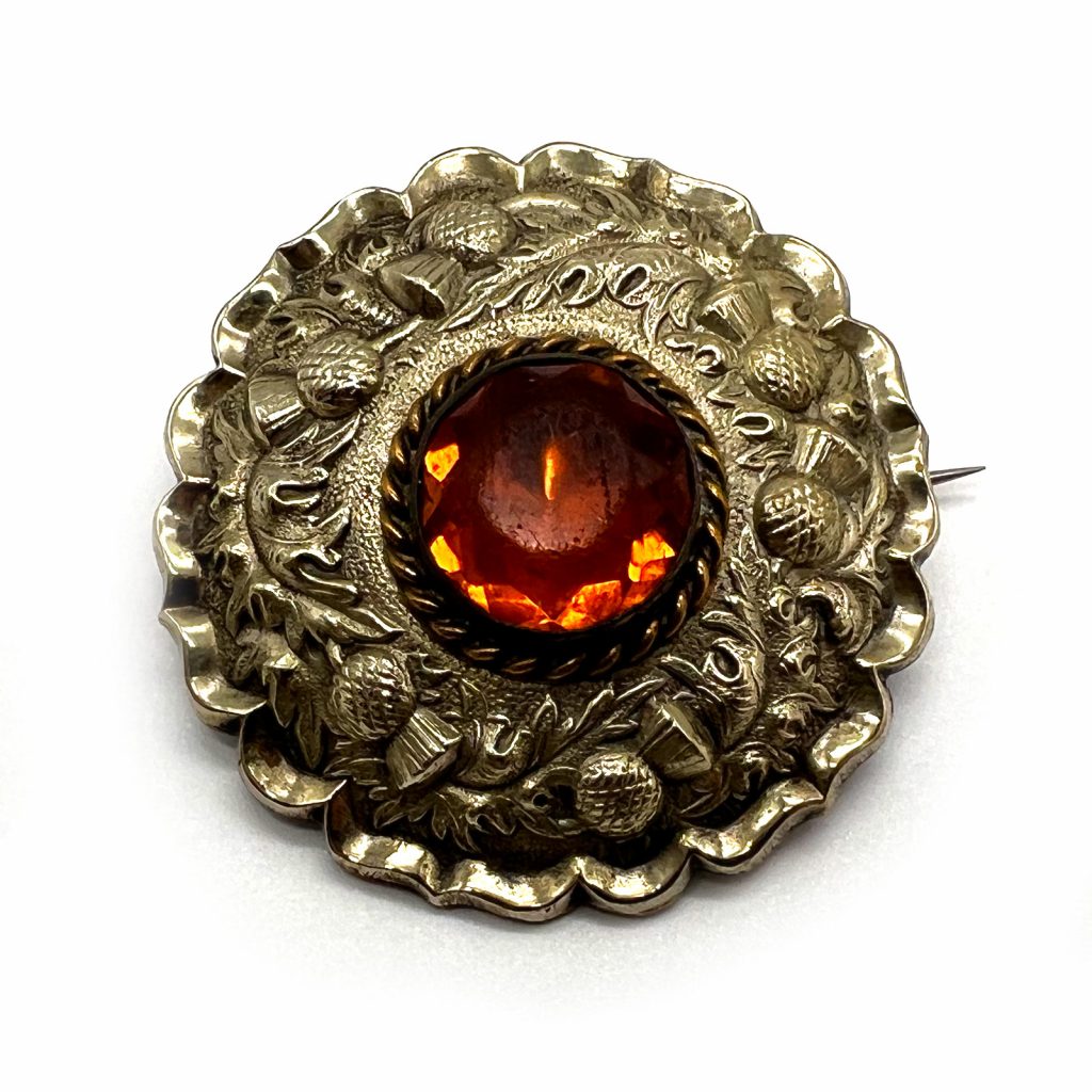 Gold tone kilt pin