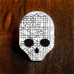Get Lost Glow in the Dark Skull Enamel Pin from Haunts & Hollows